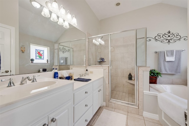 1301 Shell Beach Dr, Little Elm, TX 75068 - bathroom featuring vaulted ceiling, double vanity, a stall shower, a garden tub, and tile patterned floors