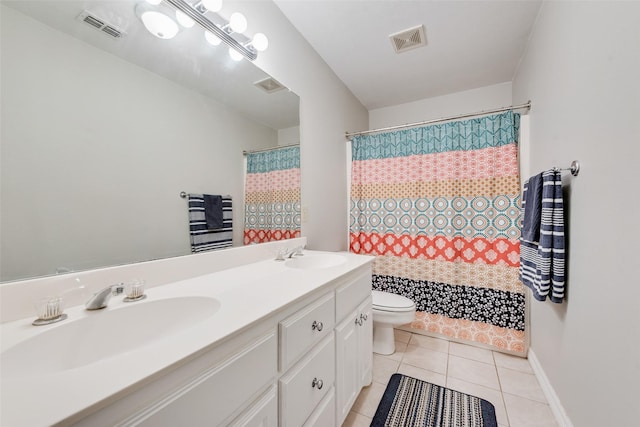 1301 Shell Beach Dr, Little Elm, TX 75068 - full bath featuring toilet, tile patterned floors, and double vanity