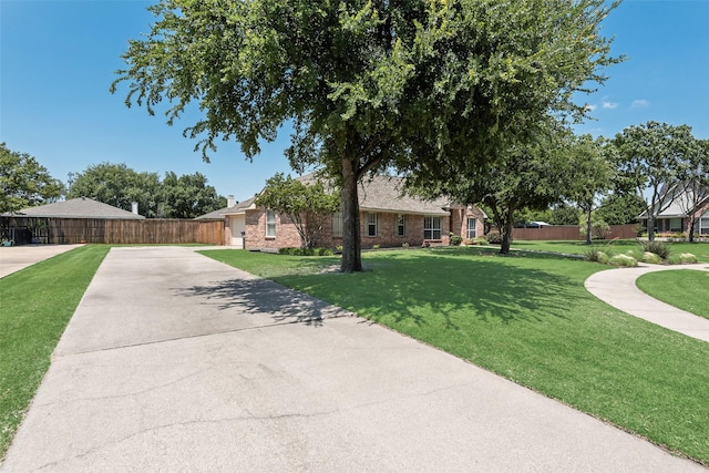 1301 Shell Beach Dr, Little Elm, TX 75068 - view of front facade featuring brick siding and driveway