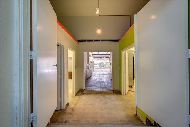 1213 Washington St Unit B, Commerce, TX 75428 - corridor with unfinished concrete flooring