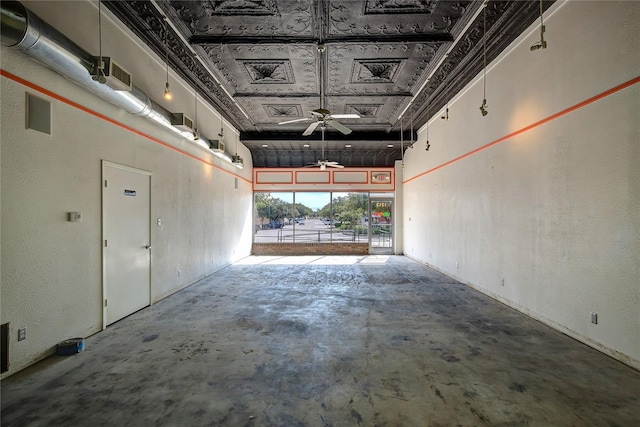 1213 Washington St Unit B, Commerce, TX 75428 - garage featuring a ceiling fan