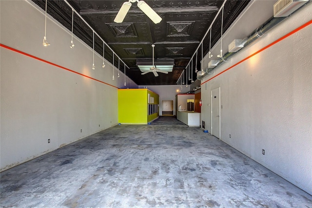 1213 Washington St Unit B, Commerce, TX 75428 - garage featuring ceiling fan