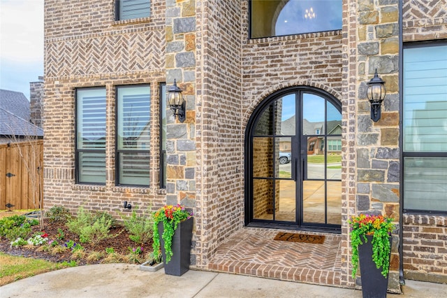 105 Shawnee Trl, Pottsboro, TX 75076 - property entrance with french doors and brick siding