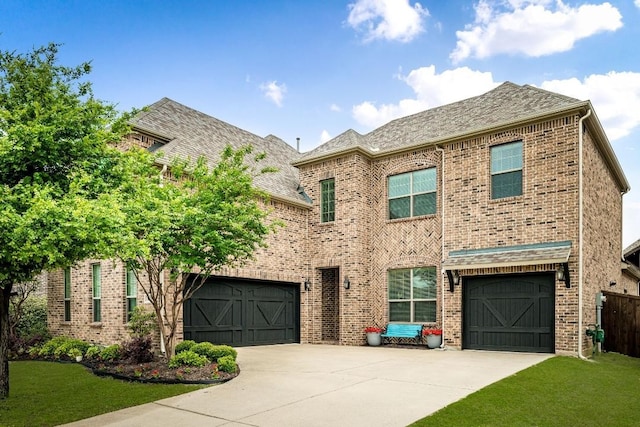 1211 Great Meadows Dr, Wylie, TX 75098 - view of front facade with concrete driveway, brick siding, and a front yard