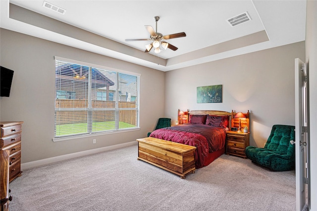 1211 Great Meadows Dr, Wylie, TX 75098 - bedroom with light colored carpet, baseboards, a tray ceiling, and ceiling fan