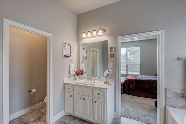 1211 Great Meadows Dr, Wylie, TX 75098 - ensuite bathroom featuring vanity, toilet, a bathtub, tile patterned floors, and baseboards