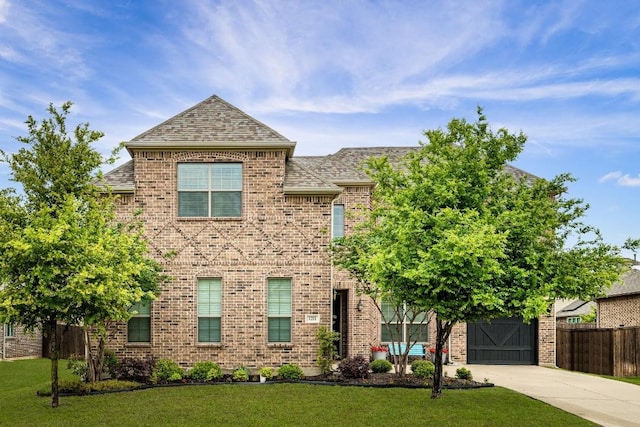 1211 Great Meadows Dr, Wylie, TX 75098 - view of front facade featuring brick siding, driveway, and roof with shingles