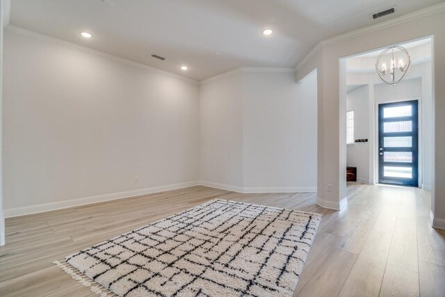 1721 Gem Dr, Rockwall, TX 75087 - unfurnished room with a chandelier, light wood-style flooring, crown molding, baseboards, and recessed lighting