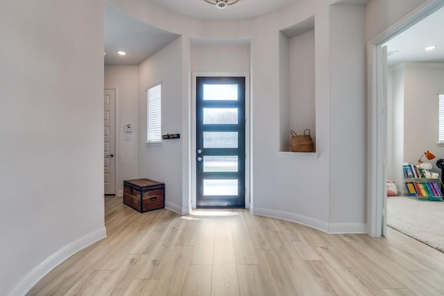 1721 Gem Dr, Rockwall, TX 75087 - foyer entrance with wood finished floors, baseboards, and recessed lighting