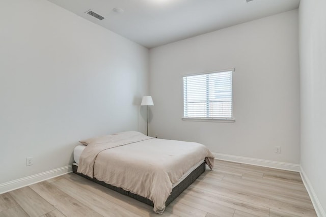1721 Gem Dr, Rockwall, TX 75087 - bedroom featuring light wood-type flooring and baseboards
