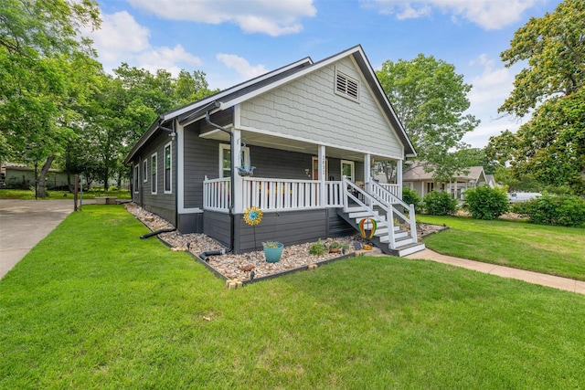2832 Forest Ave, Fort Worth, TX 76112 - view of front facade featuring covered porch and a front yard