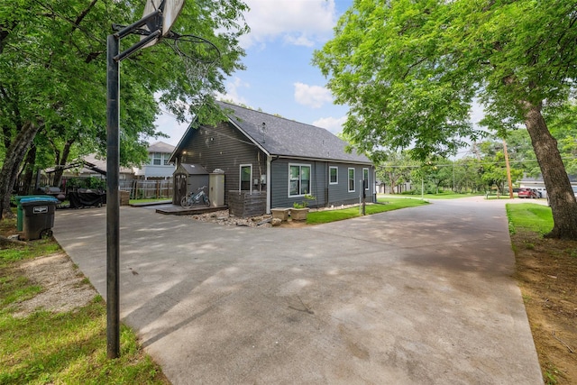 2832 Forest Ave, Fort Worth, TX 76112 - view of front of house featuring concrete driveway and roof with shingles