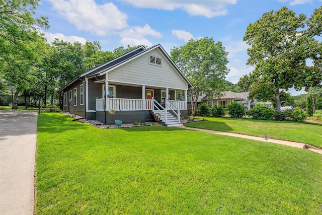 2832 Forest Ave, Fort Worth, TX 76112 - bungalow featuring a porch, a front yard, and concrete driveway