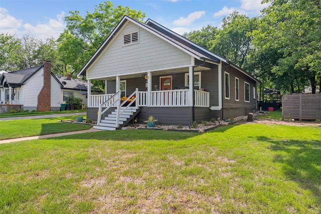 2832 Forest Ave, Fort Worth, TX 76112 - view of front of home with covered porch and a front lawn