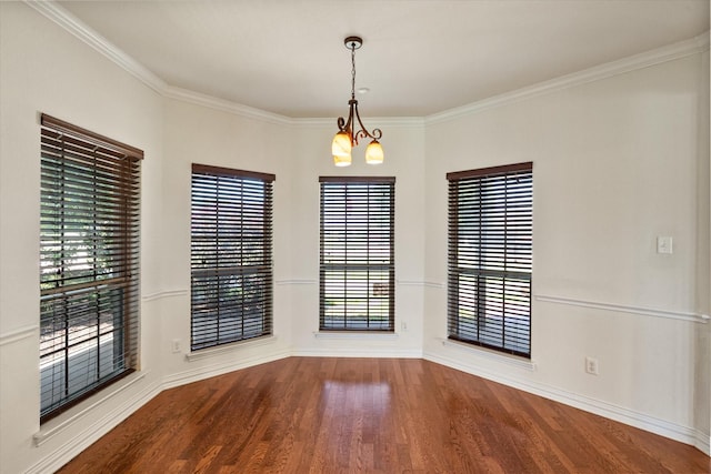 104 Spring Creek Dr, Waxahachie, TX 75165 - unfurnished room featuring wood finished floors, baseboards, a chandelier, and ornamental molding