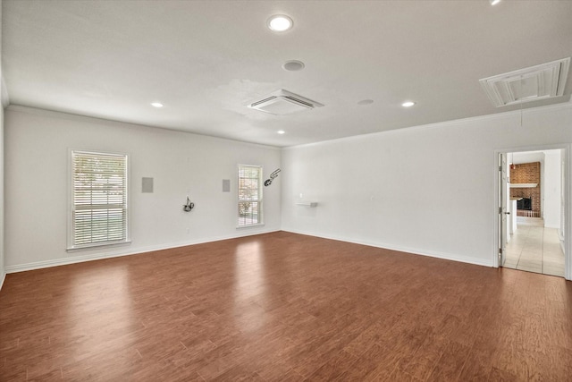 104 Spring Creek Dr, Waxahachie, TX 75165 - unfurnished room featuring attic access, ornamental molding, wood finished floors, recessed lighting, and baseboards