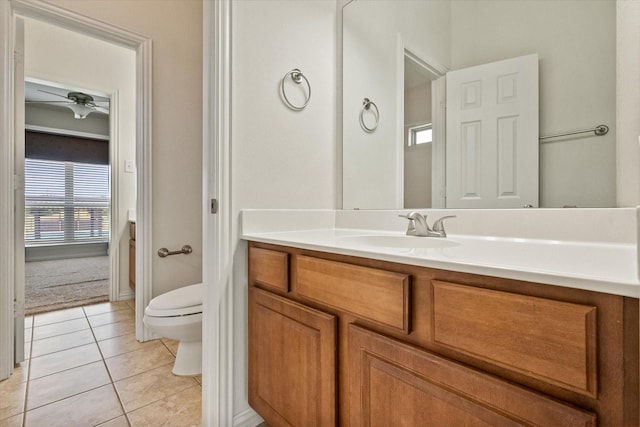 104 Spring Creek Dr, Waxahachie, TX 75165 - bathroom with toilet, vanity, tile patterned flooring, and a ceiling fan