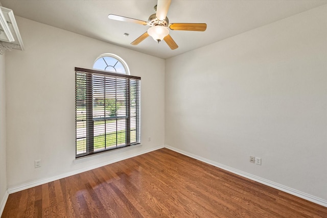104 Spring Creek Dr, Waxahachie, TX 75165 - spare room featuring plenty of natural light, wood finished floors, and baseboards