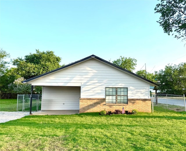 739 W Pine St, Jacksboro, TX 76458 - view of side of home with brick siding and a gate