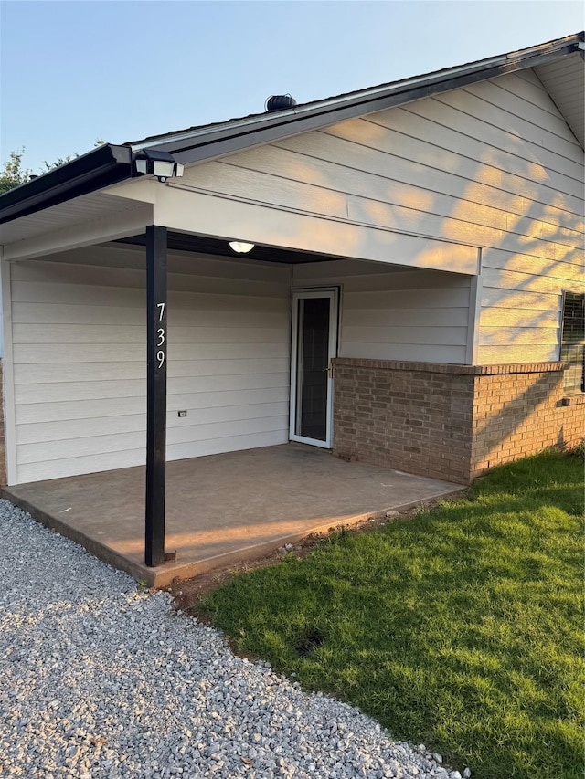 739 W Pine St, Jacksboro, TX 76458 - back of house with brick siding