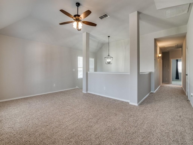 1517 Port Millstone Trl, Wylie, TX 75098 - carpeted empty room featuring lofted ceiling, a ceiling fan, baseboards, and attic access