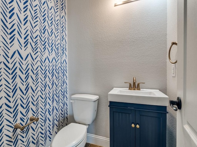 1517 Port Millstone Trl, Wylie, TX 75098 - bathroom with toilet, vanity, and a textured wall