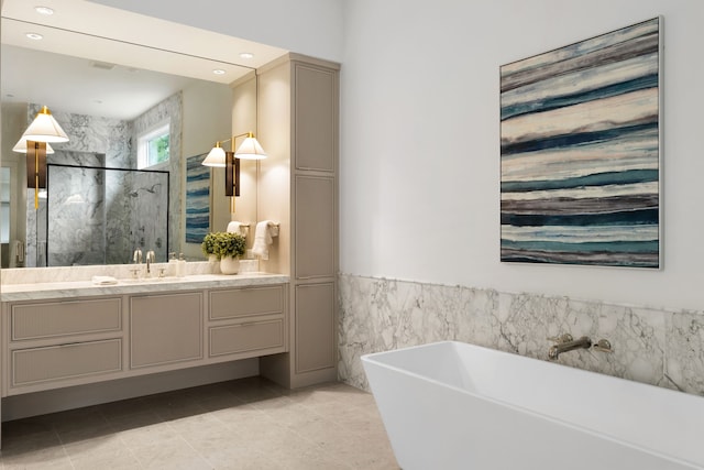 4207 Valley Ridge Rd, Dallas, TX 75220 - bathroom with vanity, a marble finish shower, a freestanding tub, tile walls, and tile patterned floors