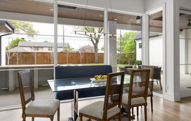 4207 Valley Ridge Rd, Dallas, TX 75220 - dining space with healthy amount of natural light and wood finished floors