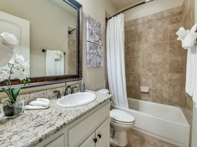 656 Clearwater Dr, Irving, TX 75039 - bathroom with vanity, toilet, and shower / bathtub combination with curtain