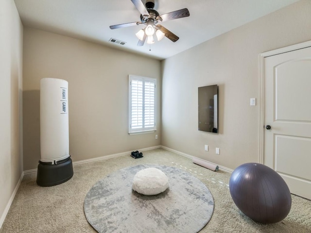 656 Clearwater Dr, Irving, TX 75039 - workout area featuring carpet flooring, ceiling fan, and baseboards