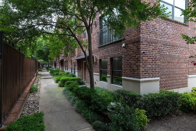 2411 N Hall St Unit 40, Dallas, TX 75204 - view of home's exterior featuring brick siding