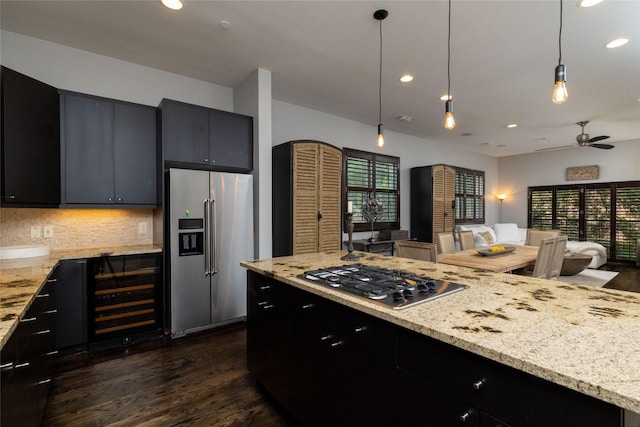 2411 N Hall St Unit 40, Dallas, TX 75204 - kitchen featuring appliances with stainless steel finishes, dark cabinets, dark wood-style floors, a ceiling fan, and recessed lighting