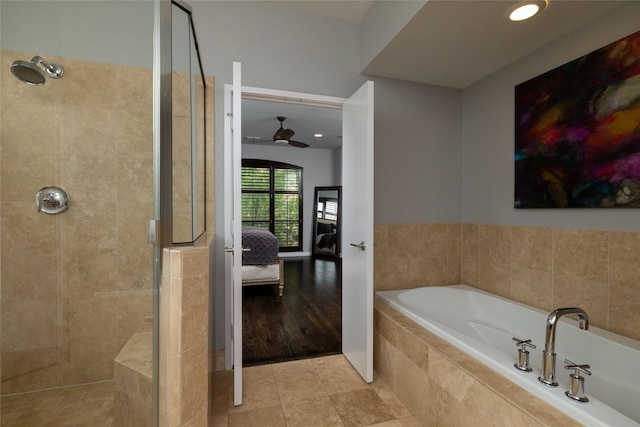 2411 N Hall St Unit 40, Dallas, TX 75204 - ensuite bathroom with a stall shower, a garden tub, ceiling fan, and tile patterned floors