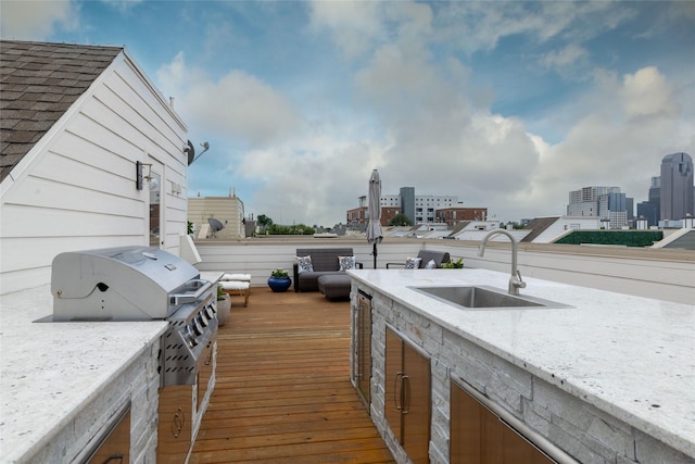 2411 N Hall St Unit 40, Dallas, TX 75204 - deck featuring a sink and a view of city