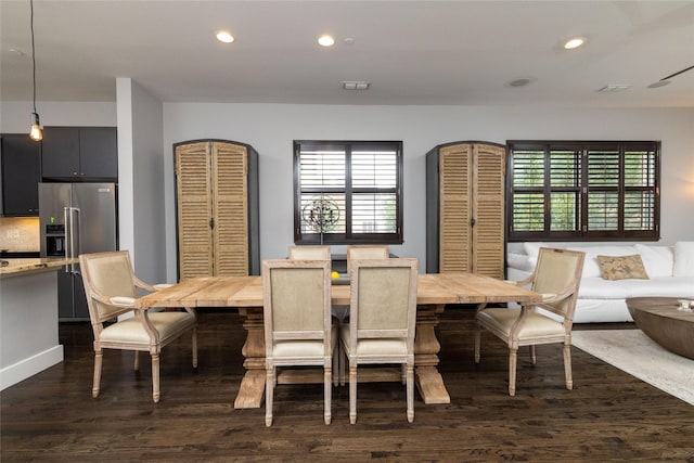 2411 N Hall St Unit 40, Dallas, TX 75204 - dining space featuring dark wood finished floors, recessed lighting, and plenty of natural light