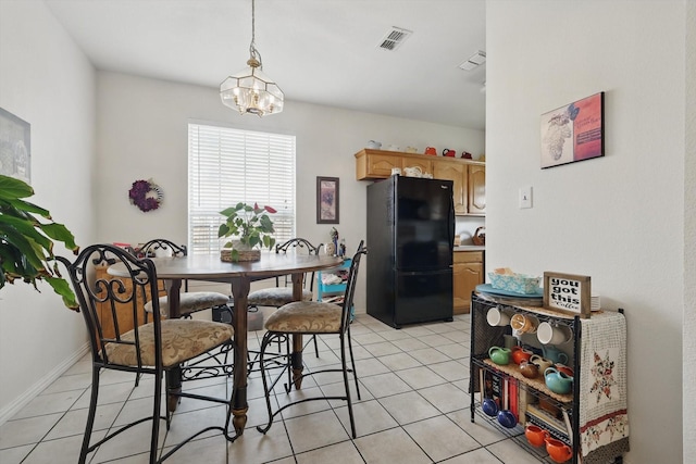 3304 Brooke St, Denton, TX 76207 - dining room with light tile patterned floors, a chandelier, and baseboards
