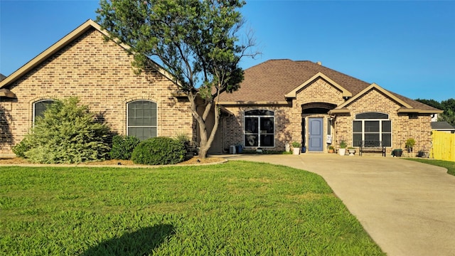 504 Greenwood Ln, Krum, TX 76249 - french country inspired facade featuring brick siding