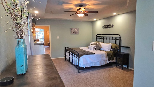 504 Greenwood Ln, Krum, TX 76249 - carpeted bedroom featuring recessed lighting, baseboards, ceiling fan, and a raised ceiling