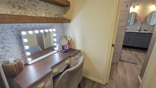 504 Greenwood Ln, Krum, TX 76249 - office with wood finished floors, baseboards, and a sink