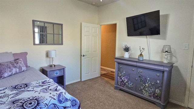 504 Greenwood Ln, Krum, TX 76249 - carpeted bedroom with baseboards