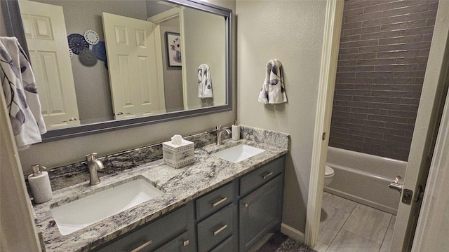 504 Greenwood Ln, Krum, TX 76249 - bathroom featuring double vanity and toilet