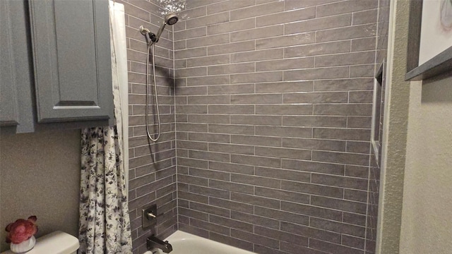 504 Greenwood Ln, Krum, TX 76249 - bathroom with shower / bath combo with shower curtain and toilet