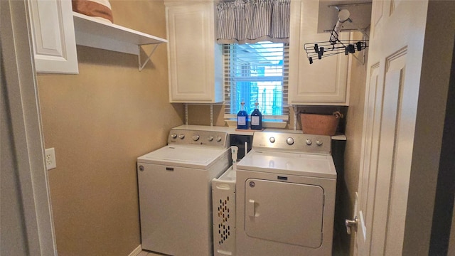 504 Greenwood Ln, Krum, TX 76249 - washroom featuring washer and clothes dryer and cabinet space