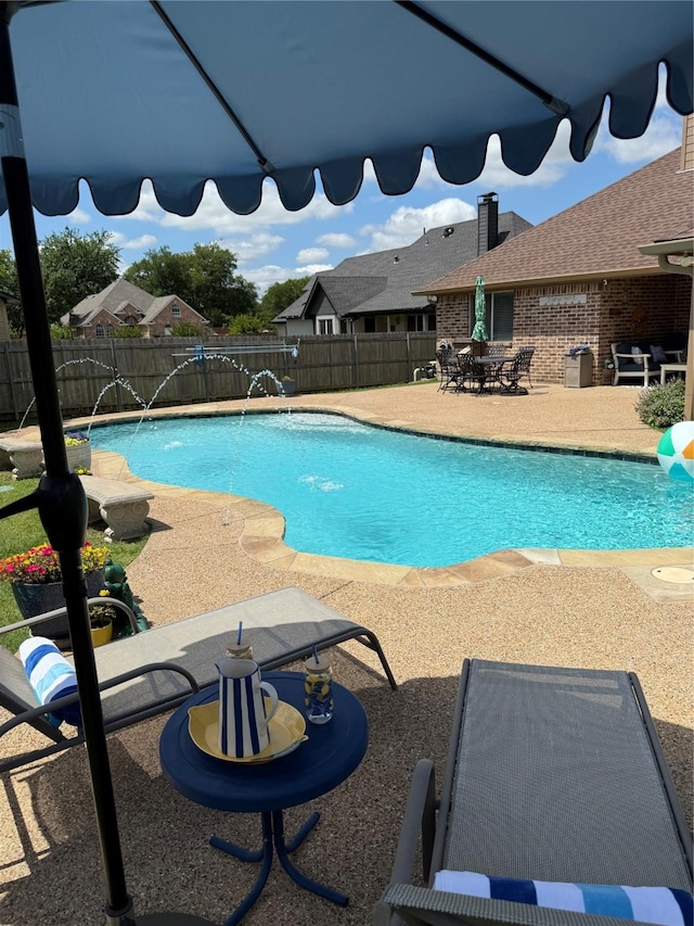 504 Greenwood Ln, Krum, TX 76249 - view of pool featuring a fenced backyard, a patio area, and outdoor dining space