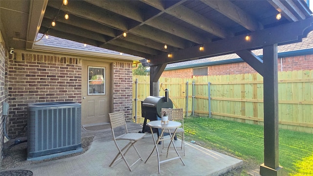 504 Greenwood Ln, Krum, TX 76249 - view of patio / terrace featuring central air condition unit and a grill