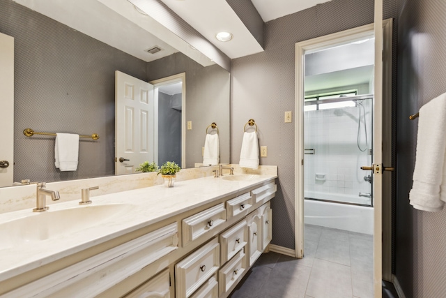 4130 High Star Ln, Dallas, TX 75287 - bathroom featuring tile patterned floors, double vanity, bath / shower combo with glass door, and baseboards