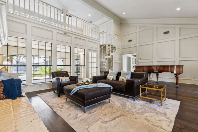 4130 High Star Ln, Dallas, TX 75287 - living area with a decorative wall, a high ceiling, dark wood-style flooring, and ornamental molding