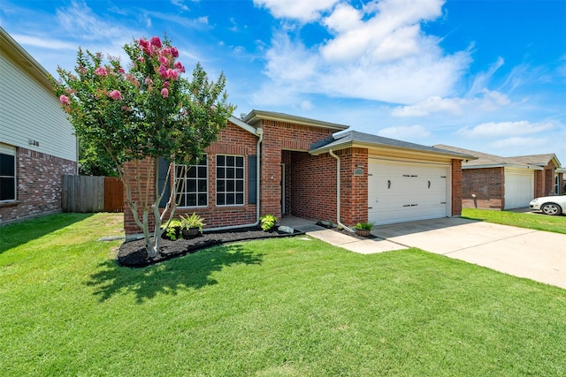 2104 Blanco Ln, Justin, TX 76247 - view of front of house featuring a garage, brick siding, and driveway
