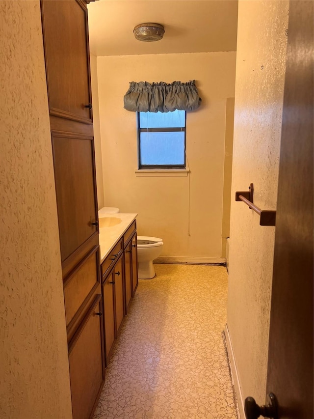7204 Bobtail Cir, Shreveport, LA 71129 - bathroom featuring vanity, tile patterned floors, a shower, and a textured wall