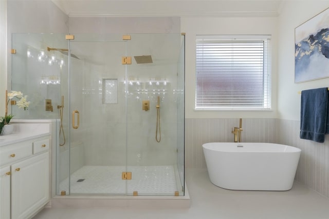 5617 Lindsey Dr, Plano, TX 75093 - full bathroom featuring crown molding, a shower stall, a freestanding bath, vanity, and a wainscoted wall